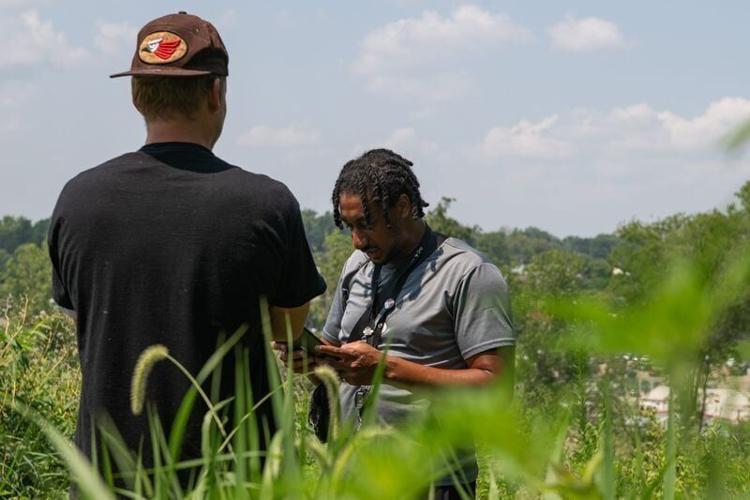 Street outreach worker Clifton Antoine, right, interviews a man experiencing homelessness during the Point-in-Time count on July 29, 2026, in Des Moines, Iowa. The annual, federally required survey collects demographic information to help estimate the s...