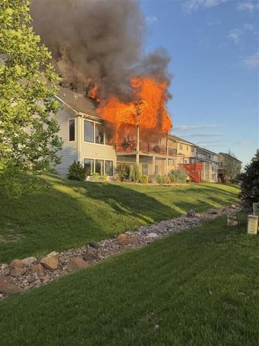 A Johnston home is a total loss after a fire on Sunday, May 10, 2026. Marek Dessimoz, a student at Dowling Catholic High School, helped save the home's sole resident.