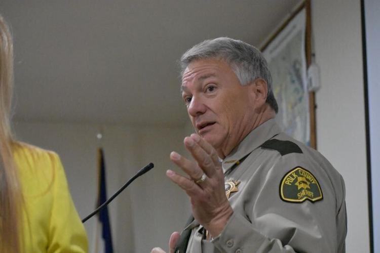 Polk County Sheriff Kevin Schneider pitched a contract not to exceed $432,021 for fiscal year 2026-27 to provide full-time law enforcement coverage in Mitchellville.