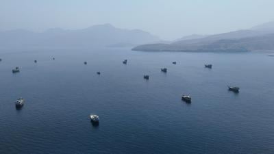 FILE PHOTO: A drone view shows vessels near the Strait of Hormuz, as seen from Musandam