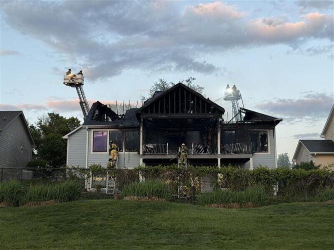 A Johnston home is a total loss after a fire on Sunday, May 10, 2026. Marek Dessimoz, a student at Dowling Catholic High School, helped save the home's sole resident.