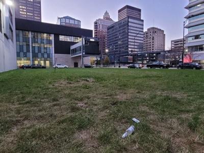 The empty lot on the north side of a parking garage at the corner of Fifth Avenue and Walnut Street that was slated to be occupied by a 40-story skyscraper as part of Mandelbaum Properties' The Fifth development.