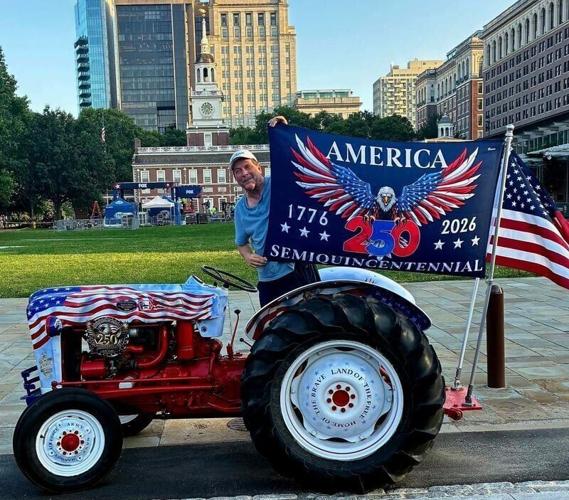 Gary Leffler stands with his tractor outside of Independence Hall.