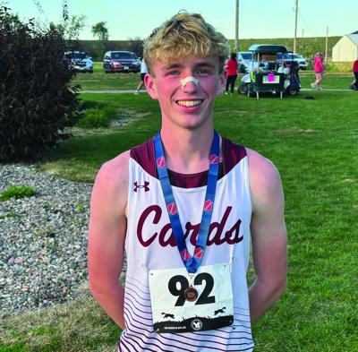 Isaiah Stogdill with medal
