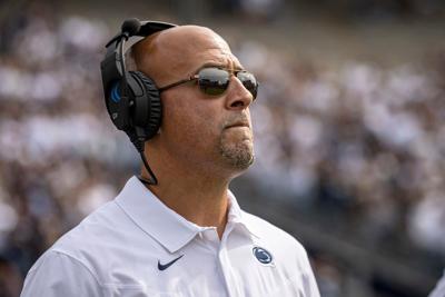 Head coach James Franklin of the Penn State Nittany Lions looks on during the second half of the game against the Villanova Wildcats at Beaver Stadium on September 25, 2021 in State College, Pennsylvania.