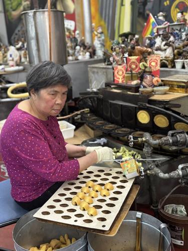 Making fortune cookies in SF Chinatown June 2026 (Eileen Ogintz)