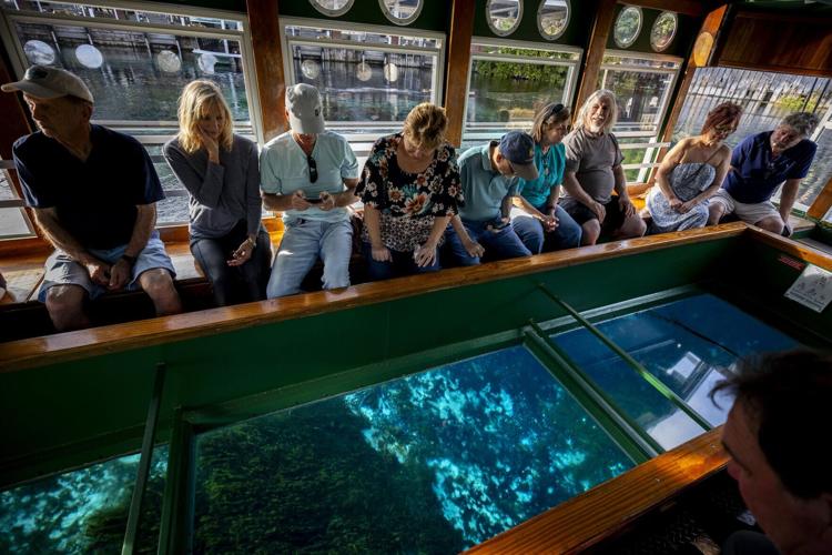 Guests enjoy a glass-bottom boat tour at Silver Springs State Park in Silver Springs on Feb. 26, 2026.