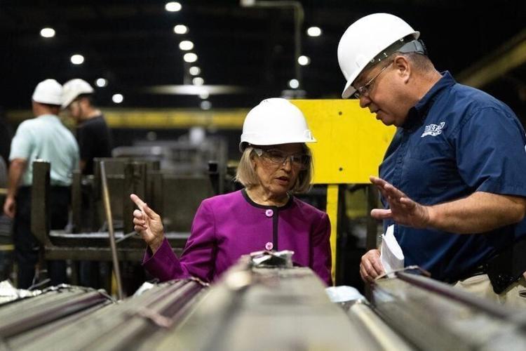 Rep. Mariannette Miller-Meeks speaks to Wilton Precision Steel Co. President W. Dennis Hanser while touring the facility Aug. 5, 2026 in Wilton, Iowa.