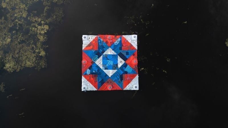 "It's in the Water" is a quilt inspired by blocks found in rural farmhouses across the Midwest. And it's buoyed by buckets of nitrate-cleansing algae.