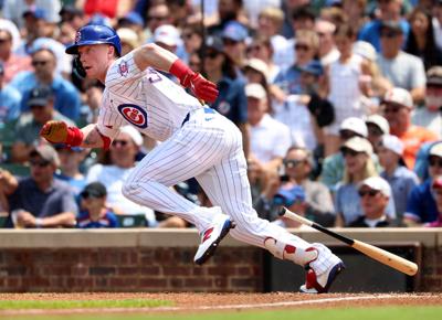 Cubs center fielder Pete Crow-Armstrong sprints to first base on an infield single against the Giants on Saturday, June 6, 2026, at Wrigley Field.