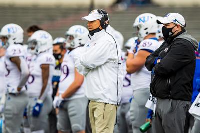 Head coach Les Miles of the Kansas Jayhawks looks on during the first half against the Texas Tech Red Raiders at Jones AT&T Stadium on December 5, 2020 in Lubbock, Texas.
