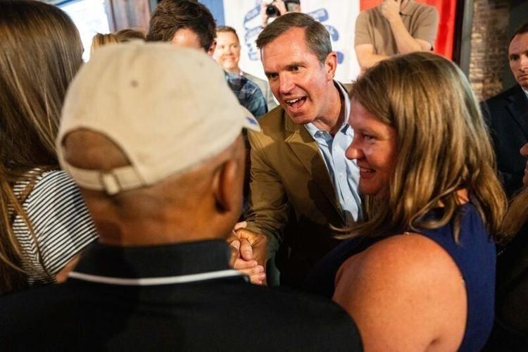 Kentucky Gov. Andy Beshear campaigns with Iowa gubernatorial candidate Rob Sand on June 7, 2026, at The River Center in Des Moines.