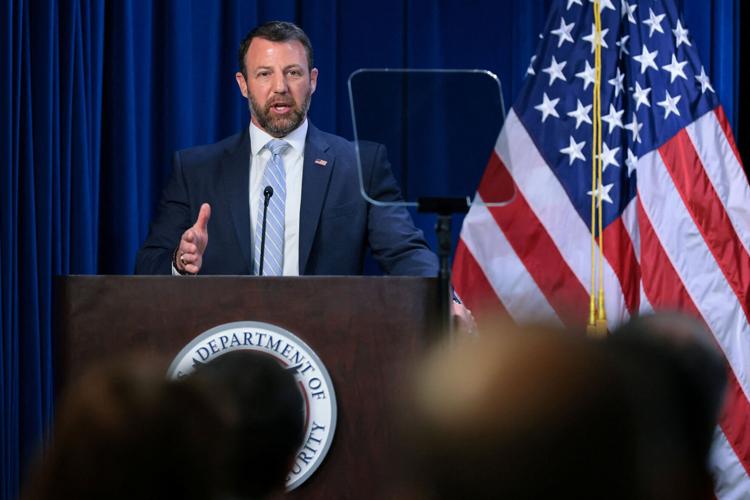 U.S. Secretary of Homeland Security Mullin participates in an event honoring fallen police officers at ICE Headquarters in Washington (copy)