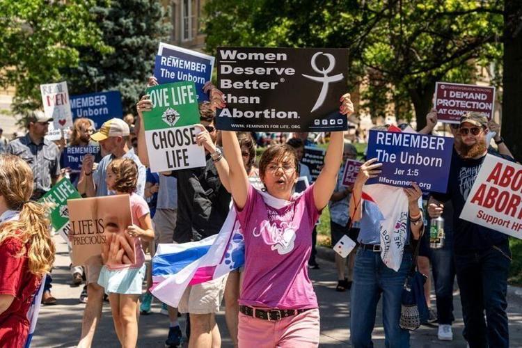 Eventgoers march during the third annual March for Life rally at the Iowa State Capitol on June 21, 2025, in Des Moines.