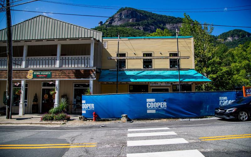After witnessing catastrophic damage after Tropical Storm Helene on Sept. 27, 2024, Peter O'Leary, Mayor of Chimney Rock and owner of Bubba O'Leary's seen here on July 30, 2026, hopes to be fully reopened by Christmas 2026. Josh Bell/Asheville Citizen Tim