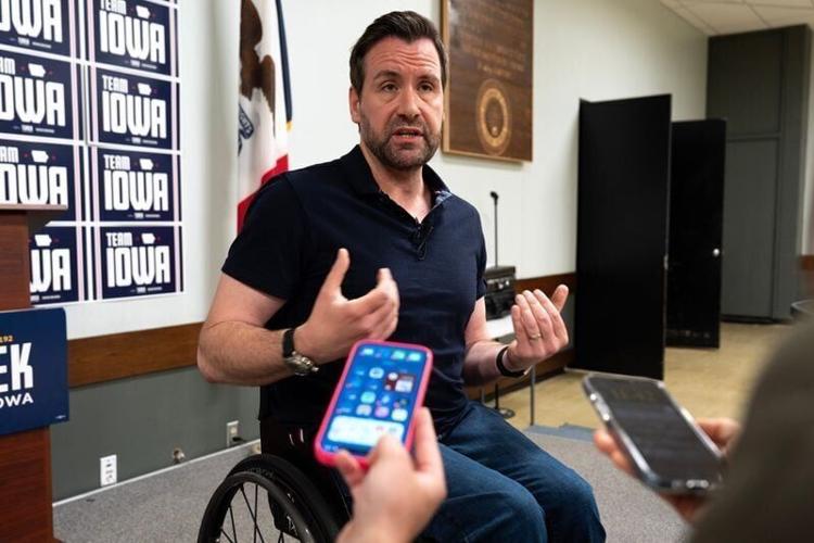 Josh Turek, democratic candidate for U.S. Senate, speaks to reporters during a campaign event July 1, 2026 at IBEW 405 Hall in Cedar Rapids, Iowa.
