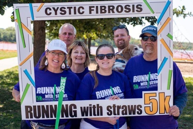 Susie Rider and other members of the Andrea's Angels fundraising team at a recent Running With Straws 5K fundraiser to benefit the Cystic Fibrosis Foundation.