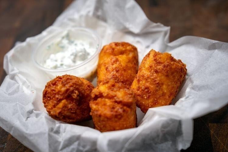 Stuffed Tater Kegs from Tater Todd and Hot Doug's are photographed during the Best New Fair Foods of 2026 contest at the Iowa State Fair on Tuesday, July 14, 2026. The item is one of the Iowa State Fair's top 11 new foods for 2026.
