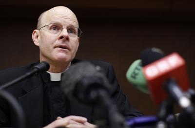 U.S. priest and psychologist Rossetti talks during a news conference in downtown Rome