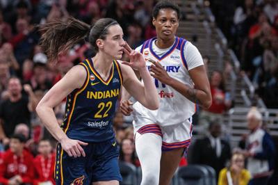Indiana Fever guard Caitlin Clark (22) celebrates a made shot in the first half against the Phoenix Mercury.