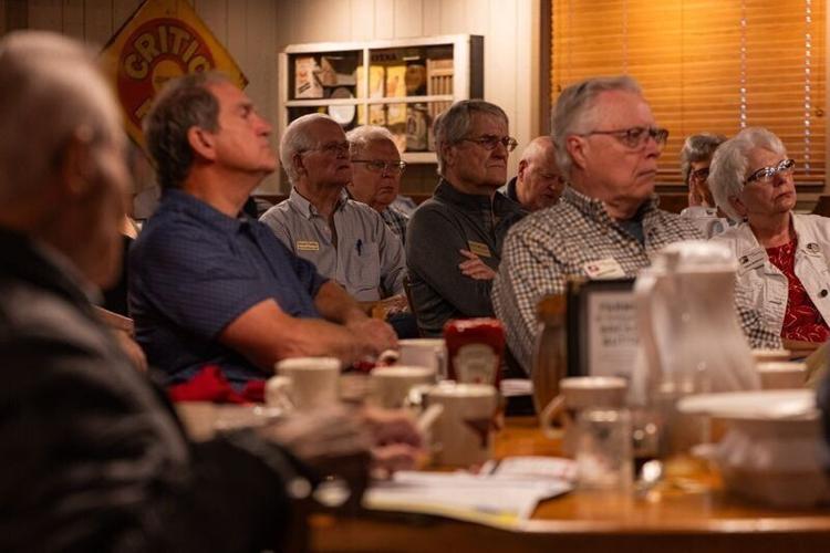 Members of the Westside Conservative Club listen to Iowa Secretary of State Paul Pate speak at an event on Aug. 26, 2026, in Urbandale.