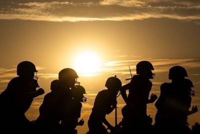 DCG football takes the field for their game against Dowling Catholic on Sept. 12, 2025, at Dallas Center-Grimes High School.