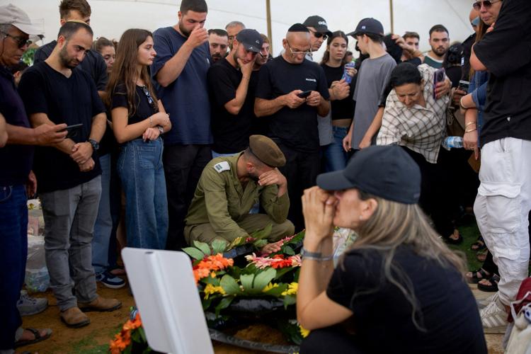 Mourners attend the funeral of Captain David Hazutt an Israeli soldier who, according to the Israeli military, was killed in an encounter with a Hezbollah militant in southern Lebanon, in Ashkelon