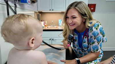 Dr. Emily Eyerkuss examines Maren Gaw, 9 months, Fair Haven, at IMA Pediatric in Red Bank Thursday, August 13, 2026.  The Trump