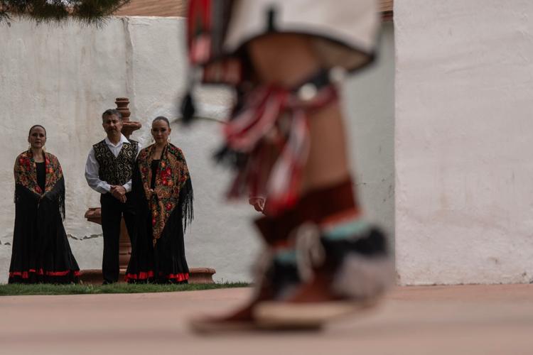 Tigua dancers of the Ysleta del Sur Pueblo perform outside the historic mission in San Elizario, Texas, during a cultural reenactment of borderlands history. The event reflects generations of Indigenous, Mexican and American influences that have shaped ide