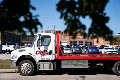 A Crow Tow truck is seen along Mulberry Street in downtown Des Moines.