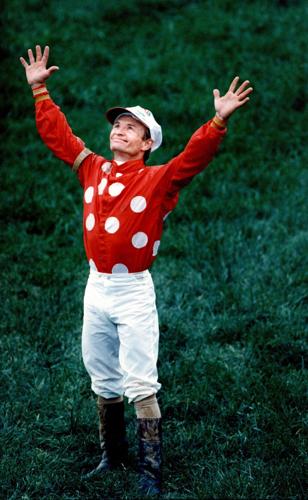 Jockey Pat Day jumps off Kentucky Derby-winning mount Lil E Tee on May 2, 1992 and praises God. It was Dayâ€™s only Derby victory in his illustrious career.