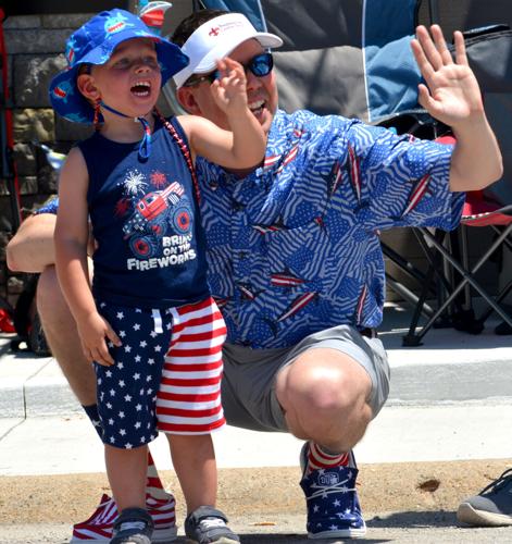 HJ - Waving at Floats.jpg
