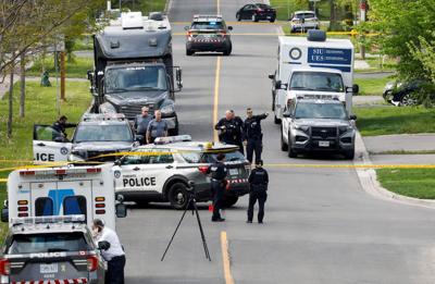 Toronto Police shot and killed a man who was carrying a firearm near three schools, police say