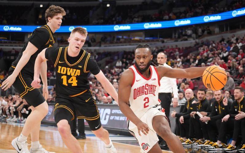 Mar 12, 2026; Chicago, IL, USA; Iowa Hawkeyes guard Bennett Stirtz (14) defends Ohio State Buckeyes guard Bruce Thornton (2) during the first half at United Center.