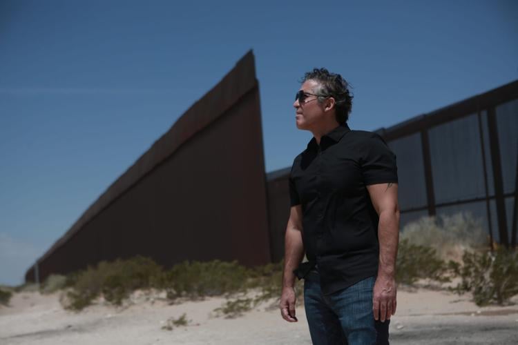 Nicholas Natividad looks across the U.S.-Mexico border between Ciudad Ciudad Juárez and Sunland Park, N.M., in the Paso del Norte region. A descendant of families who lived through multiple shifts of the border, Natividad studies how generations of Mexica