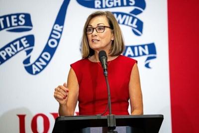Gov. Kim Reynolds speaks to delegates during the GOP state convention on June 13, 2026, at the Horizon Events Center in Clive.