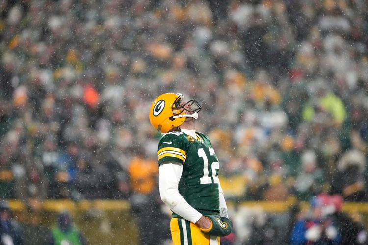 Green Bay Packers quarterback Aaron Rodgers looks skyward during the fourth quarter against the San Francisco 49 ers in an NFC Divisional Playoff game at Lambeau Field on Saturday, Jan. 22, 2022, in Green Bay, Wisconsin.