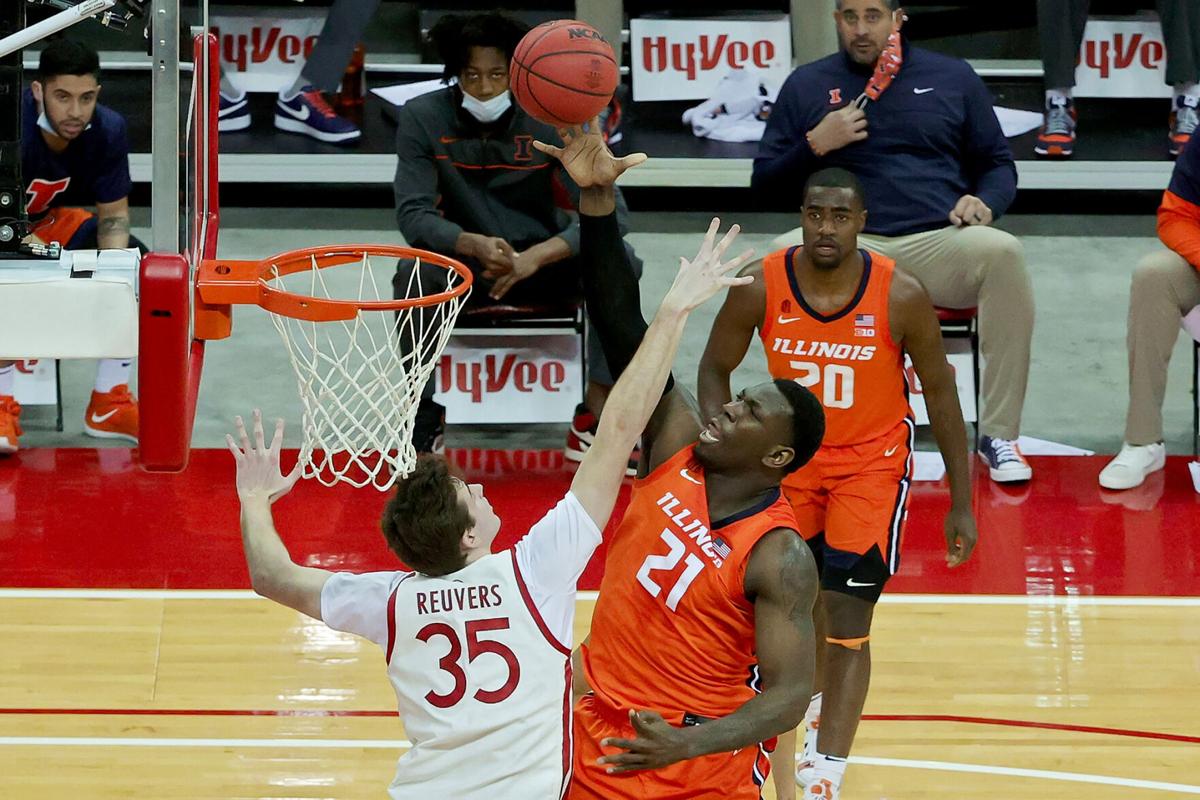 Illinois' Kofi Cockburn attacks the rim against Wisconsin's Nate Reuvers in the second half at the Kohl Center in Madison, Wisconsin, on Saturday, Feb. 27, 2021.