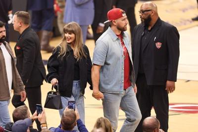 May 23, 2026; Cleveland, Ohio, USA; Taylor Swift and Travis Kelce during game three of the eastern conference finals for the 2026 NBA playoffs between the New York Knicks and Cleveland Cavaliers at Rocket Arena. Mandatory Credit: Scott Galvin-Imagn Images