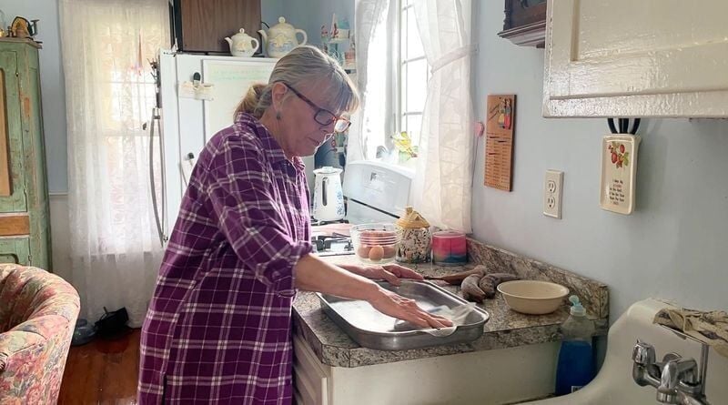 Madison County Supervisor Diane Fitch bakes banana bread in the kitchen of her St. Charles home.