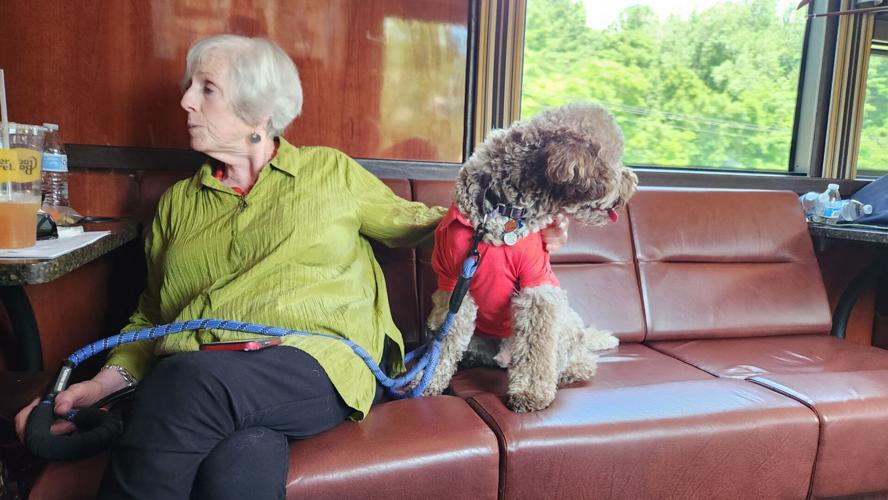Former Ohio Supreme Court Chief Justice Maureen O'Connor and Carlo the dog on the Justice in Motion bus on July 8, 2026
