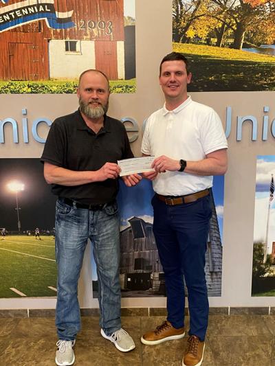 Atomic Credit Union donates to Festival of Flags