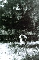 GOD Photo - Ralph Matney Playing with Pet Squirrel.jpg