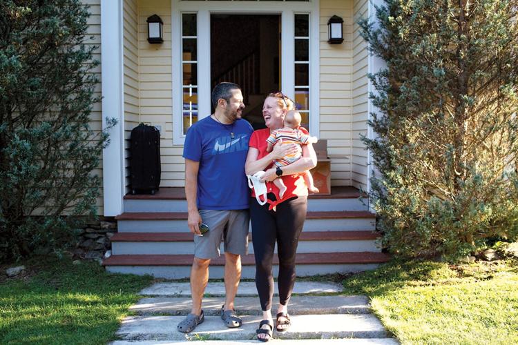 Eliza and son on the steps of her father’s home