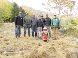 Stowe firefighters with the new dry hydrant installed at 2481 Nebraska Valley Road.