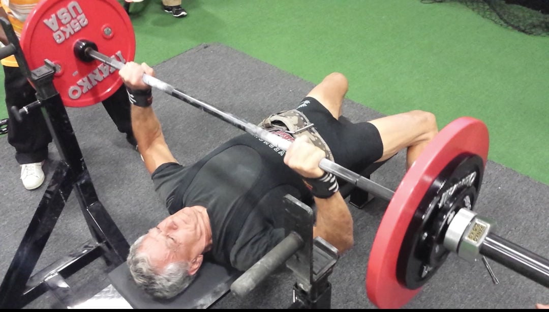 Former CVU teacher sets world record for competitive weightlifting Sports vtcng