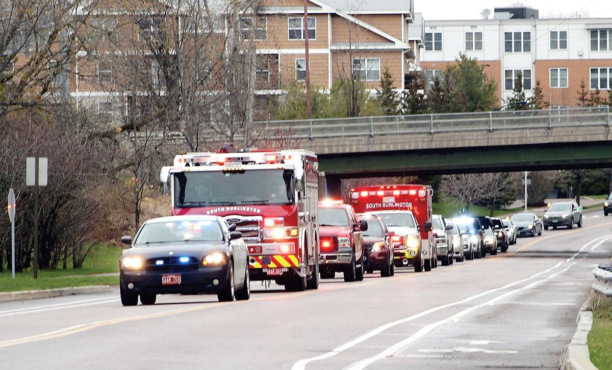 A caravan of about 60 vehicles