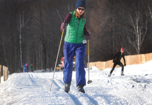 A skier in classical gear slides along a track at Trapps Nordic Center Tuesday, Dec. 24.