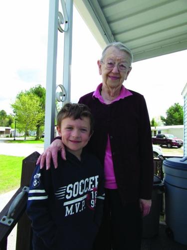 Pictured here is Thomas with Jean Gallant after he delivered her meal on Monday, May 19.