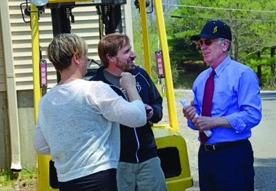 Alchemist co-owners Jen and John Kimmich chat with U.S. Rep. Peter Welch (right) on May 14 during an event to discuss a proposed FDA rule that would make it harder for brewers to donate spent grain to farmers.